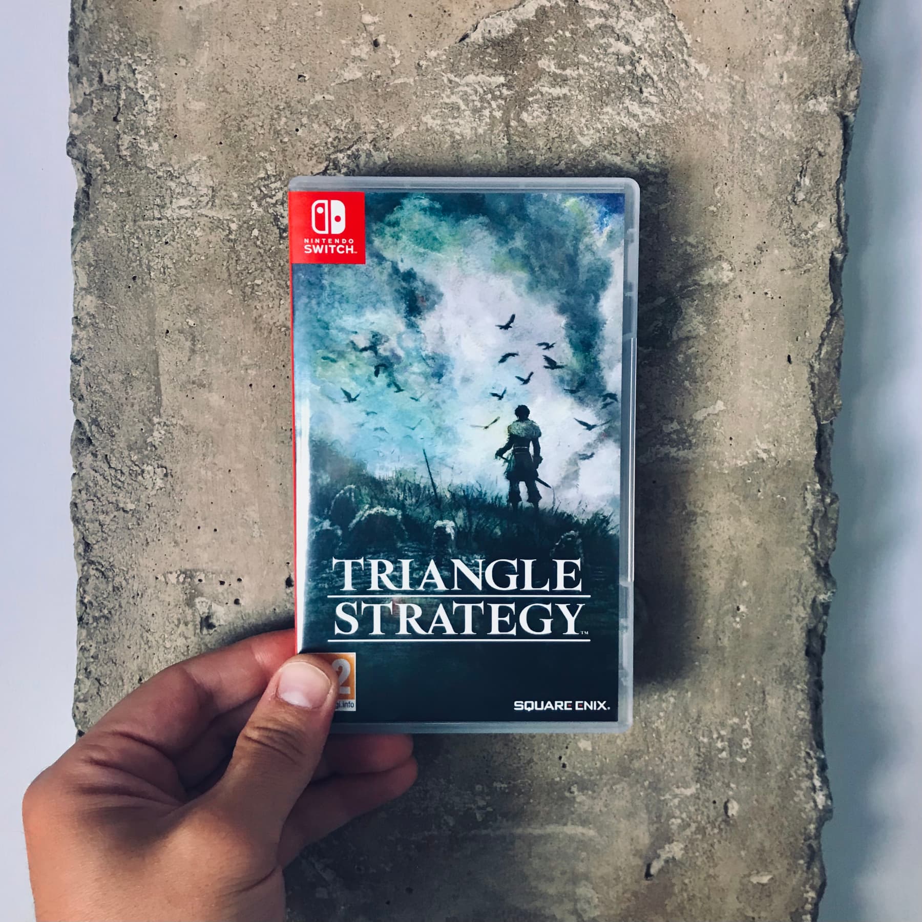 Portada del videojuego: Triangle Strategy